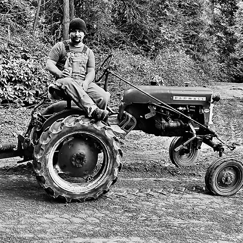 Ken on a tractor